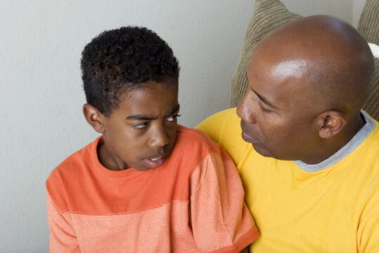 Divorced father talking to an estranged child